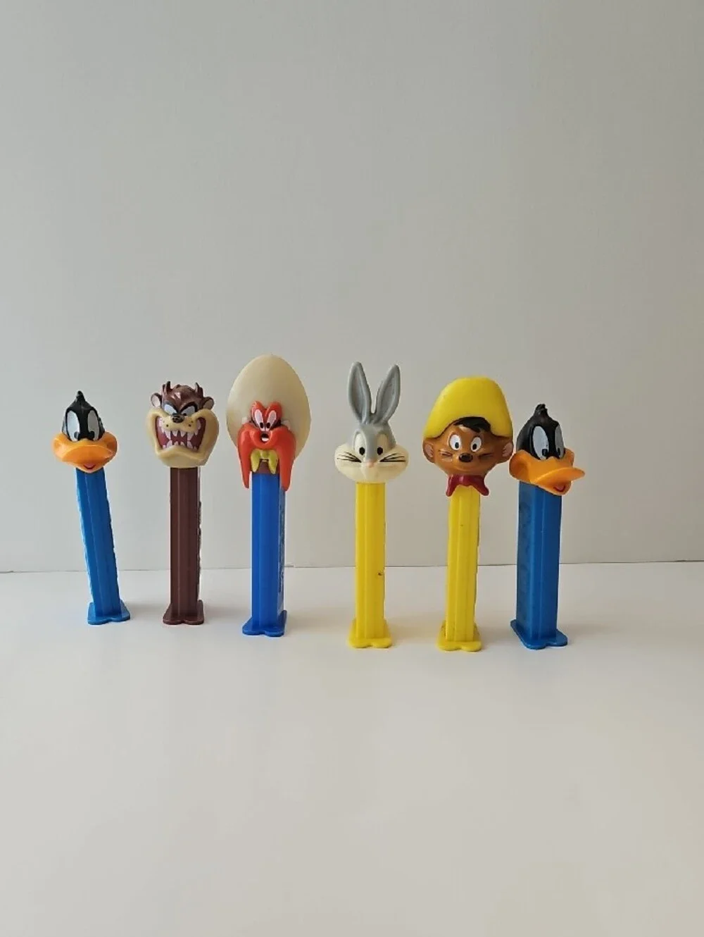 Vintage-Classic Cartoon Character PEZ Candy Dispensers - Blue, Yellow, Brown